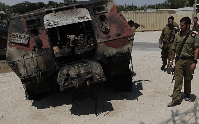 The remains of an Egyptian military vehicle that smashed through the border fence and into Israel (Photo credit: Tsafrir Abayov/ Flash 90)