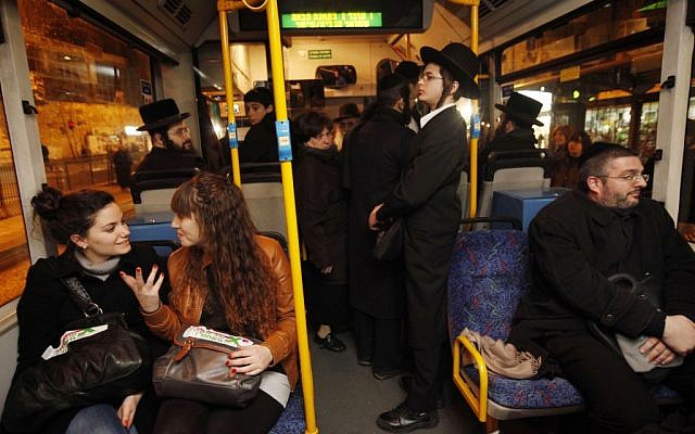 A crowded Jerusalem bus in January.  Is this the reason why there are less buses in Mea Sharim now?  (photo credit:  Miriam Alster / Flash90)