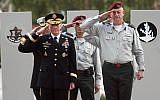 US Chairman of Joint Chiefs of Staff Martin Dempsey, left, and IDF Chief of General Staff Benny Gantz saluting during Dempsey's visit to Israel in January. (photo credit: Gideon Markowicz/Flash90)