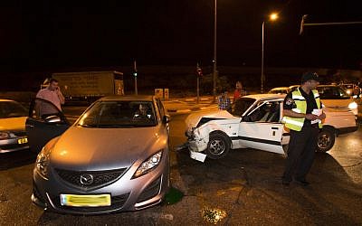 The car of Knesset member Zevulun Orlev after he was involved in a car crash in Jerusalem on Sunday (photo credit: Yonatan Sindel/Flash90)