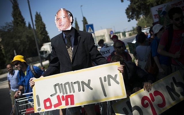 An protesters dressed as Benjamin Netanyahu protesting the high cost of living in Jerusalem Monday. (photo credit: Yonatan Sindel/Flash90) An protesters dressed as Benjamin Netanyahu protesting the high cost of living in Jerusalem Monday. (photo credit: Yonatan Sindel/Flash90)