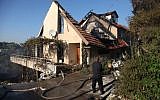 .A house gutted by fire in Kiryat Tivon Thursday (photo credit: Avishag Shaar Yashuv/Flash90)