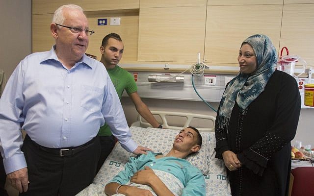 Knesset Speaker Reuven Rivlin visits Jamal Julani at Hadassah Ein Kerem Hospital prior to his release on Thursday (photo credit: Yonatan Sindel/Flash90) Knesset Speaker Reuven Rivlin visits Jamal Julani at Hadassah Ein Kerem Hospital prior to his release on Thursday (photo credit: Yonatan Sindel/Flash90)