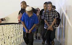 The three young suspects from Bat Ayin arrive at Jerusalem Magistrates Court on Sunday (photo crtedit: Yonatan Sjndel/Flash90)