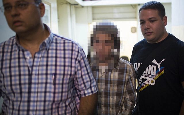 One of the suspected fire bombers in court, August 27 (photo credit: Yonatan Sindel/Flash90) One of the suspected fire bombers in court, August 27 (photo credit: Yonatan Sindel/Flash90)