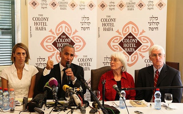 Hussein Abu Hussein, surrounded by Rachel Corrie's family, speaking to reporters Tuesday. (photo credit: Avishag Shaar Yashuv/Flash90) Hussein Abu Hussein, surrounded by Rachel Corrie's family, speaking to reporters Tuesday. (photo credit: Avishag Shaar Yashuv/Flash90)