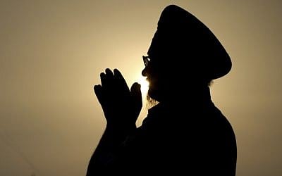 An Indian Sikh devotee offers prayers at the Golden Temple, Sikh's holiest shrine in Amritsar, India, August 6, 2012. (AP Photo/Sanjeev Syal) An Indian Sikh devotee offers prayers at the Golden Temple, Sikh's holiest shrine in Amritsar, India, August 6, 2012. (AP Photo/Sanjeev Syal)