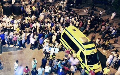 Egyptians stand outside a hospital in El-Arish, northern Sinai, following the terrorist attack on August 5, 2012  (photo credit: AP photo)