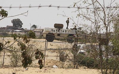 Egyptian guards on patrol in Rafah, near the Egypt-Israel border (photo credit: AP/Ahmed Gomaa)