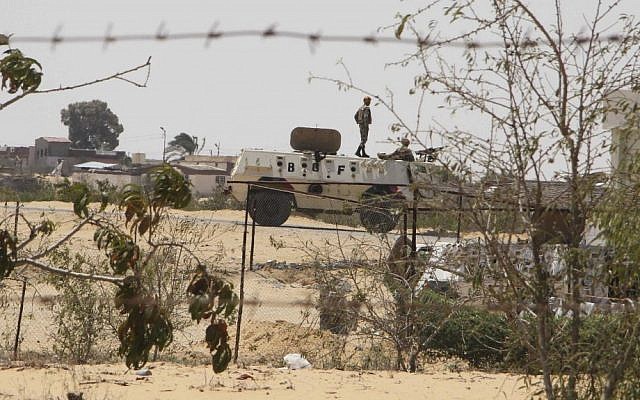 Egyptian guards on patrol in Rafah, near the Egypt-Israel border (photo credit: AP/Ahmed Gomaa)