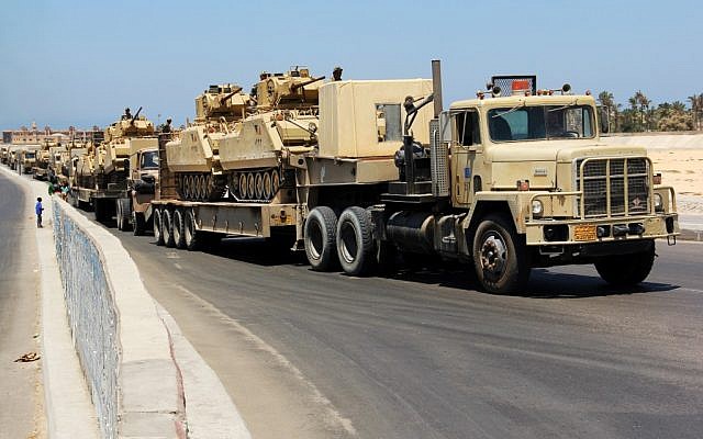 Illustrative. Army trucks carry Egyptian military tanks in el-Arish, in the northern Sinai Peninsula, August 2012 (AP) Illustrative. Army trucks carry Egyptian military tanks in el-Arish, in the northern Sinai Peninsula, August 2012 (AP)