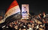 A pro-Morsi demonstration at Cairo's Tahrir Square, August 12 (photo credit: AP/Amr Nabil)