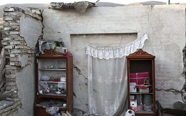 Remains of a building following an earthquake in a village near the city of Varzaqan in northwestern Iran, Monday, Aug. 13 (photo credit: AP/Mehr News Agency, Armin Karami) Remains of a building following an earthquake in a village near the city of Varzaqan in northwestern Iran, Monday, Aug. 13 (photo credit: AP/Mehr News Agency, Armin Karami)