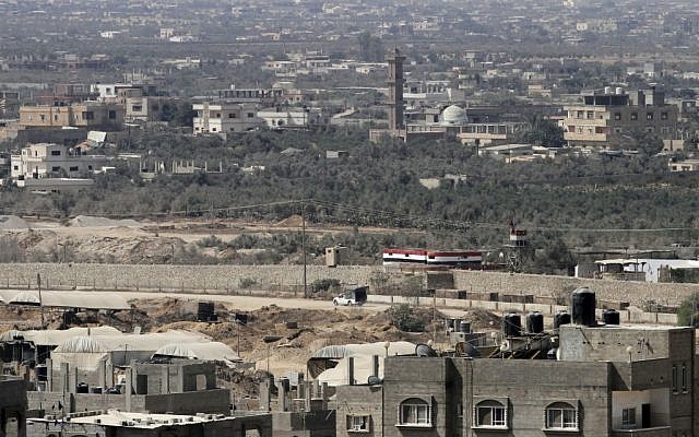 A view of the smuggling tunnels area along Egypt Gaza border is seen from Rafah, southern Gaza Strip, Monday, Aug. 6, 2012 (photo credit: AP Photo/Hatem Moussa) A view of the smuggling tunnels area along Egypt Gaza border is seen from Rafah, southern Gaza Strip, Monday, Aug. 6, 2012 (photo credit: AP Photo/Hatem Moussa)