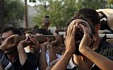 A Syrian man chants slogans during the funeral of a rebel in Aleppo, August 9 (photo credit: AP Photo/ Khalil Hamra)