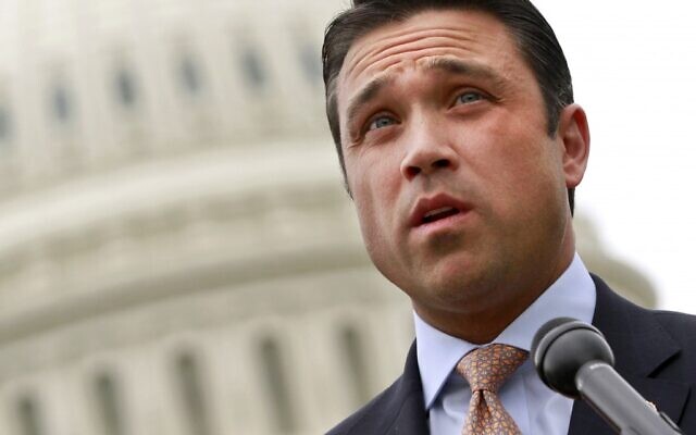 In this May 9, 2012 file photo, Rep. Michael Grimm, R-N.Y., speaks at a news conference on Capitol Hill in Washington. On Friday, Aug. 17, 2012, businessman Ofer Biton, an Israeli who helped raise hundreds of thousands of dollars for Grimm during his 2010 campaign, was arraigned in New York on immigration fraud charges. (AP Photo/Jacquelyn Martin, File)