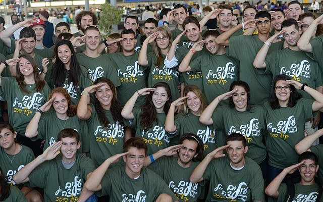 Some of the 127 Nefesh B'Nefesh immigrants who arrived in Israel on Tuesday morning and plan to enlist in the IDF (photo credit: Shahar Azran/JTA) Some of the 127 Nefesh B'Nefesh immigrants who arrived in Israel on Tuesday morning and plan to enlist in the IDF (photo credit: Shahar Azran/JTA)