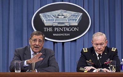 Leon Panetta (left) warns of Iranian-backed militias in Syria (photo credit: AP Photo/Evan Vucci)