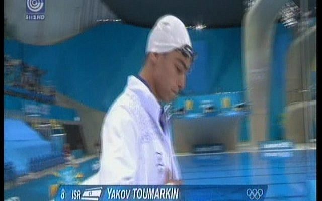 Israeli Swimmer Yakov Toumarkin prepares to compete in the 200 meter backstroke Olympic finals on Thursday, Aug. 2 (image capture Channel 1) Israeli Swimmer Yakov Toumarkin prepares to compete in the 200 meter backstroke Olympic finals on Thursday, Aug. 2 (image capture Channel 1)