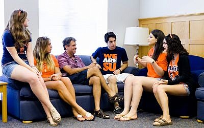 Hillel President Wayne Firestone, third form left, speaking with Syracuse University student outreach leaders at the Hillel Institute, hosted by Washington University in St. Louis, August 2012. (photo credit: Paul Granados/JTA) Hillel President Wayne Firestone, third form left, speaking with Syracuse University student outreach leaders at the Hillel Institute, hosted by Washington University in St. Louis, August 2012. (photo credit: Paul Granados/JTA)