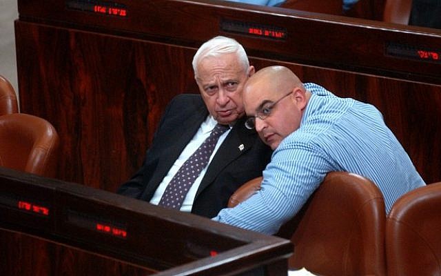Ariel Sharon (left) with his son Omri at the Knesset (photo credit: Flash90)