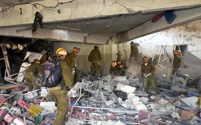 IDF rescue workers at the wreckage of the Taba Hilton hotel, October 8, 2004 (photo credit: IDF/ Flash90) IDF rescue workers at the wreckage of the Taba Hilton hotel, October 8, 2004 (photo credit: IDF/ Flash90)