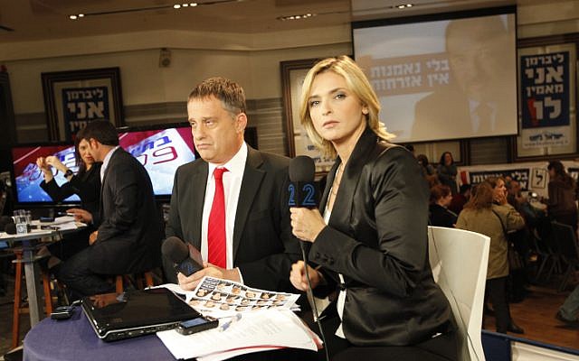 Emmanuel Rosen (left) with colleague Dana Weiss in a television studio in 2009. Rozen was recently detained in Libya while filming a documentary. (photo credit: Nati Shohat/Flash90)
