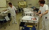 Newborn babies are attended by nurses at Bikur Holim hospital in Jerusalem. (Flash90)