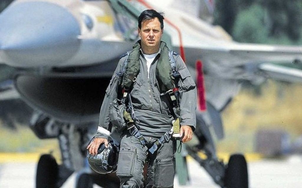 File: Ilan Ramon, the first Israeli astronaut, stands in front of an F-16 fighter jet. Ramon perished in the disintegration of the Space Shuttle Columbia on February 1, 2003, while re-entering the atmosphere. (Flash90)