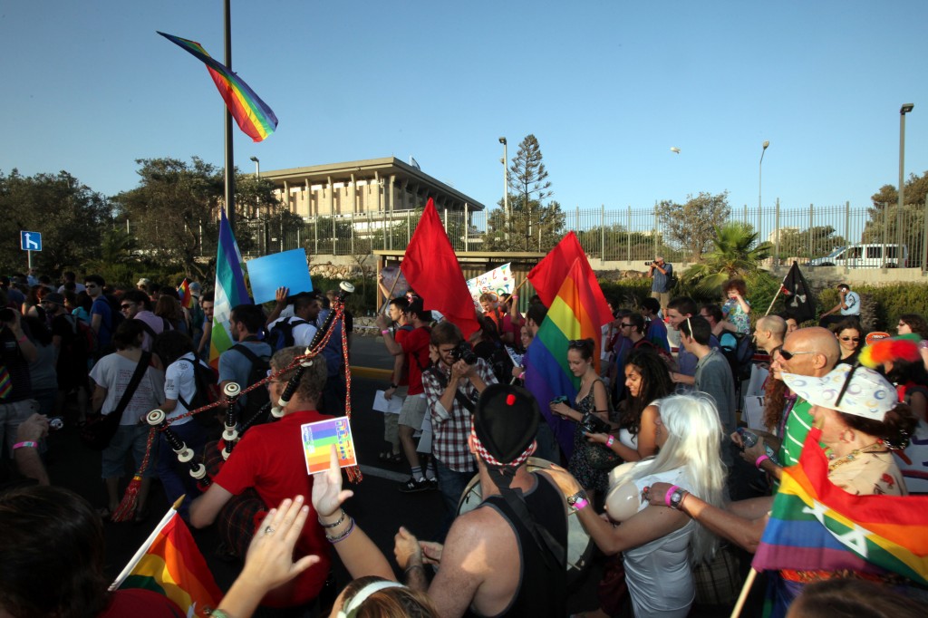 Gay pride parade participants marching in Jerusalem during the 2011 parade. (photo credit: Yossi Zamir/Flash90) Gay pride parade participants marching in Jerusalem during the 2011 parade. (photo credit: Yossi Zamir/Flash90)