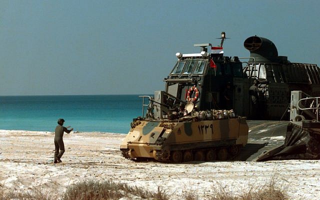 American soldiers offloading an Egyptian armored fighting vehicle during a joint exercise in Egypt in 2004. (Photo credit: Courtesy Department of Defense/Benjamin D. Olvey, U.S. Navy)