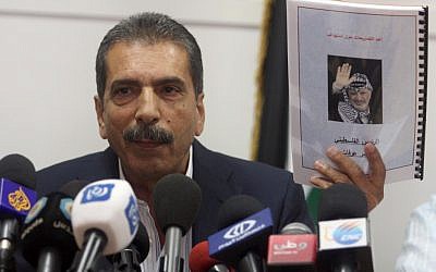 Palestinian investigator Tawfik Terawi at a press conference in Ramallah on Wednesday announced that Palestinian officials have invited Swiss experts to test Yasser Arafat's remains for possible poisoning. (photo credit: Issam Rimawi/Flash90)