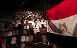 Gaza residents pray outside the Egyptian embassy in solidarity with Egypt following the attack (photo credit: Wissam Nassar/Flash90)