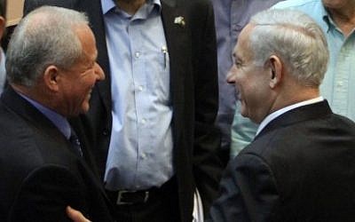 Avi Dichter is congratulated by Prime Minister Benjamin Netanyahu and other MKs after being appointed the new home front defense minister on August 16, 2012 (photo credit: Yoav Ari Dudkevitch/Flash90)