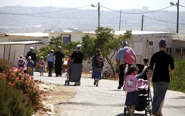 Residents of the evacuated settlement of Migron in 2012. (photo credit: Lior Mizrahi/Flash90)