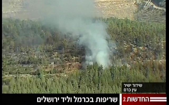 Fire rages near Moshav Even Sapir (image capture Channel2)