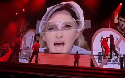 Madonna announced the removal of this swastika imagery from her stage show (photo credit: Youtube screen capture)