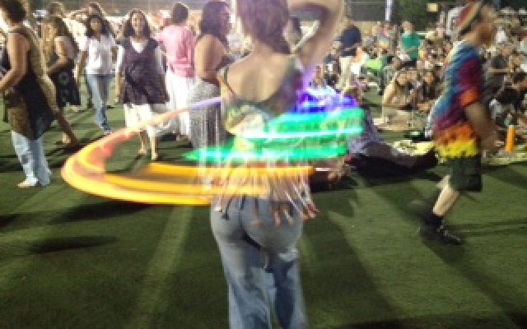 Working the glow-in-the-dark hula hoop (photo credit: Jessica Steinberg)