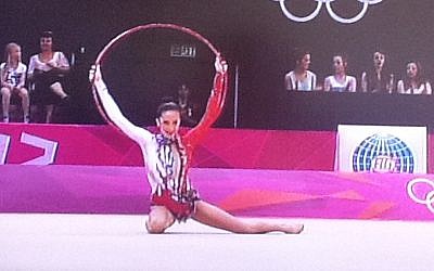 Rhythmic gymnast Neta Rivkin in action in the Olympic finals on Saturday (photo credit: Channel 1 screenshot)