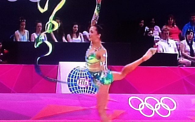 Rivkin performs with the ribbon in the Olympic finals on Saturday (photo credit: Channel 1 screenshot) Rivkin performs with the ribbon in the Olympic finals on Saturday (photo credit: Channel 1 screenshot)