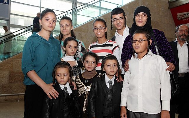 Luiza Nahari and the four children who arrived in Israel on Sunday morning are reunited at Ben Gurion airport with her other five children who immigrated more than three years ago (photo credit: Sasson Tiram, The Jewish Agency for Israel) Luiza Nahari and the four children who arrived in Israel on Sunday morning are reunited at Ben Gurion airport with her other five children who immigrated more than three years ago (photo credit: Sasson Tiram, The Jewish Agency for Israel)