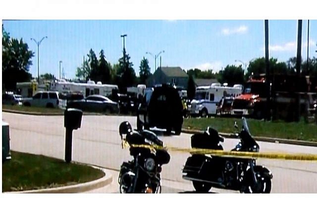 The scene outside a Sikh temple in Wisconsin where a shooting took place on Sunday. (photo credit: Image capture from YouTube video uploaded by wiseuppeopletv) The scene outside a Sikh temple in Wisconsin where a shooting took place on Sunday. (photo credit: Image capture from YouTube video uploaded by wiseuppeopletv)