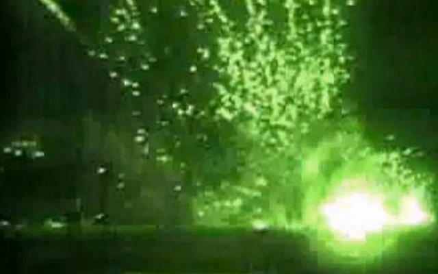 A screengrab from a YouTube video purporting to show a missile striking near al-Arish. (Screenshot via YouTube)