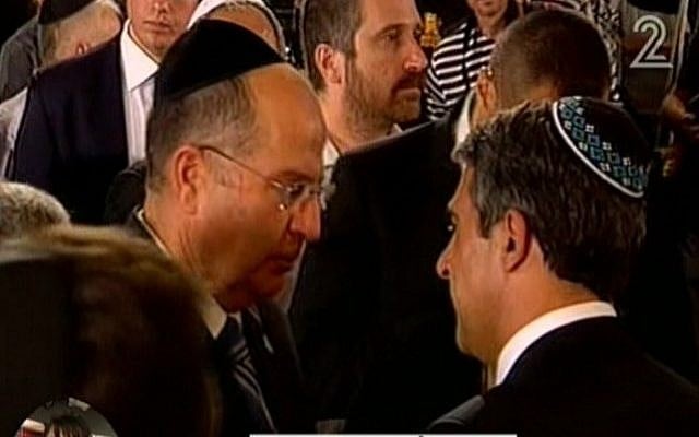Moshe Ya'alon, left, at the memorial ceremony in Burgas on Tuesday. (Screenshot: Channel 2)
