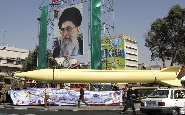 A military exhibition displays the Shahab-3 missile under a picture of the Iranian Supreme Leader Ayatollah Ali Khamenei, in Tehran, in 2008. (photo credit: AP/Hasan Sarbakhshian) A military exhibition displays the Shahab-3 missile under a picture of the Iranian Supreme Leader Ayatollah Ali Khamenei, in Tehran, in 2008. (photo credit: AP/Hasan Sarbakhshian)