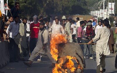 Pakistanis protesting the anti-Islam film in Islamabad on Thursday. (photo credit: AP/B.K. Bangash)