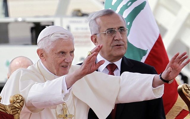 Pope Benedict XVI stands next to Lebanese President Michel Suleiman as he waves to the crowd at Rafik Hariri international airport in Beirut on Friday (photo credit: AP/Bilal Hussein) Pope Benedict XVI stands next to Lebanese President Michel Suleiman as he waves to the crowd at Rafik Hariri international airport in Beirut on Friday (photo credit: AP/Bilal Hussein)