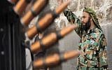 A Free Syrian Army fighter in Aleppo, September 1 (photo credit: AP)