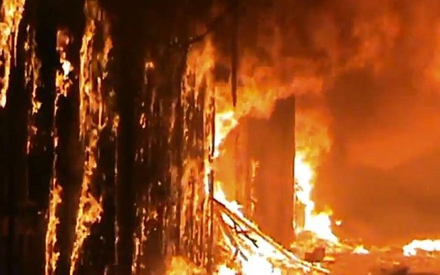 In this image taken from video obtained from Shaam News Network (SNN), which has been authenticated based on its contents and other AP reporting, a fire rages at a medieval souk in Aleppo, Syria. (photo credit: AP) In this image taken from video obtained from Shaam News Network (SNN), which has been authenticated based on its contents and other AP reporting, a fire rages at a medieval souk in Aleppo, Syria. (photo credit: AP)