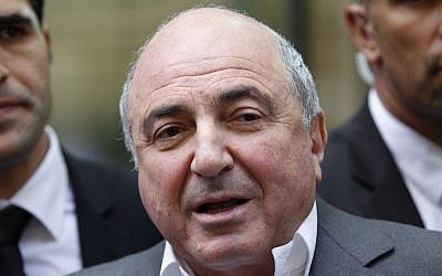 Russian tycoon Boris Berezovsky talks to the media after losing a case against Russian oligarch Roman Abramovich as he leaves the High Court in London, in 2012. (photo credit: AP)